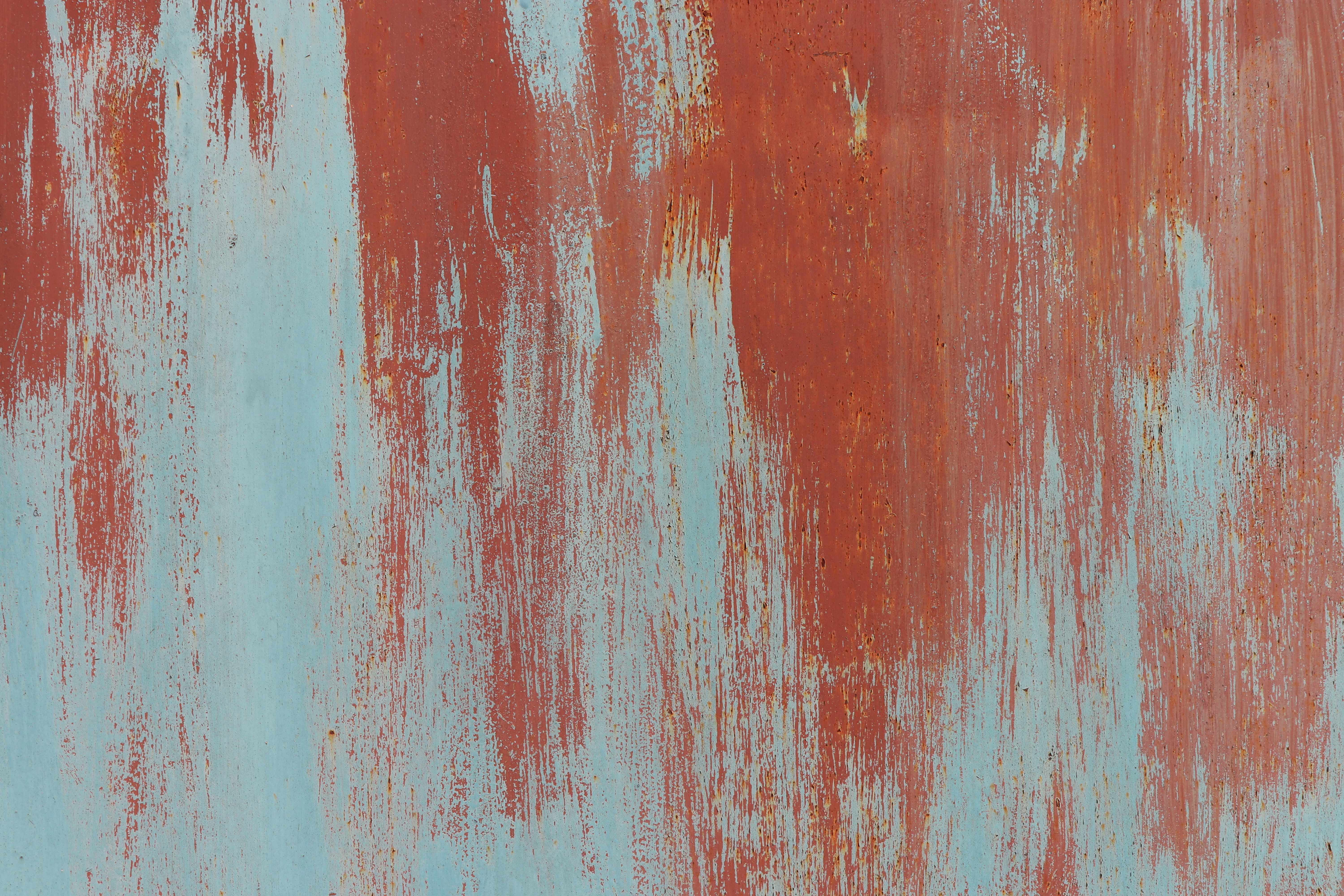 Old Weathered Blue Rust on Red Painted Wall Texture. Brush Strokes.