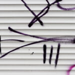 Urban Street Art. Graffiti tag on guard metal steel wall.