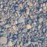 Beach stones surface. Marine mineral beauty harmony. Sea pebble texture.