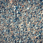 Beach stones surface. Marine mineral beauty harmony. Sea pebble texture.