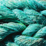 Big fat blue mooring rope texture. Nautical marine background.