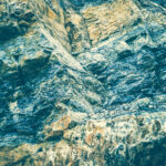 Laminate rock texture. Mountain pattern background.