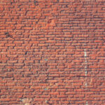 Red bricks wall texture. Concrete blocks wall background.