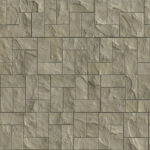 Beige outdoor stone cladding seamless surface. Stone tiles facing house wall.