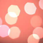 Pink bokeh background. Blurred colored texture. Happy color love creative backdrop. Bright glowing colorful pattern. Defocused sweet design.