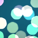 Blue bokeh background. Blurred colored texture. Happy color love creative backdrop. Bright glowing colorful pattern. Defocused sweet design.