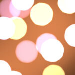 Orange happy color love creative backdrop. Bright glowing colorful pattern. Defocused sweet design. Bokeh background. Blurred colored texture.
