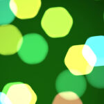 Green defocused sweet design. Bokeh background. Blurred colored texture. Happy color love creative backdrop. Bright glowing colorful pattern.