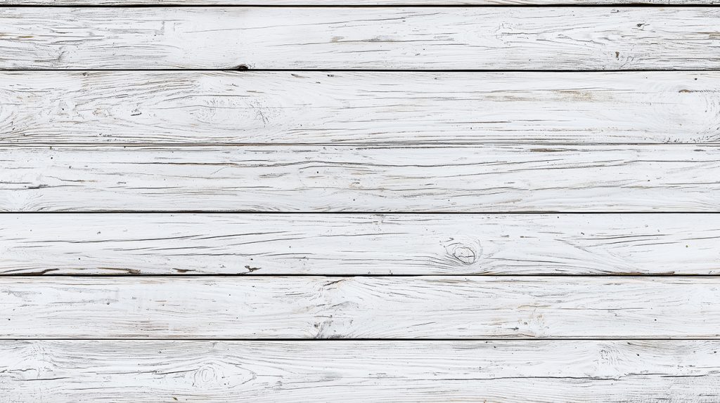 Weathered white wooden planks arranged horizontally, showcasing natural textures and grain patterns.